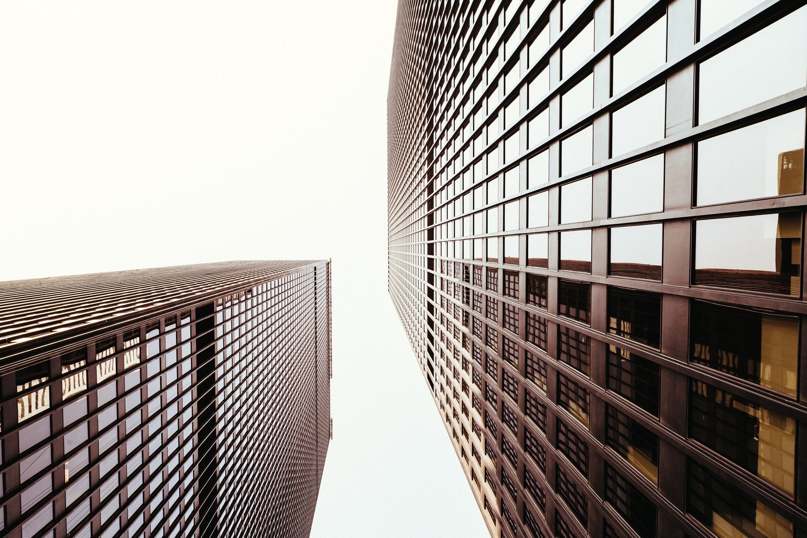 Looking up at tall city buildings